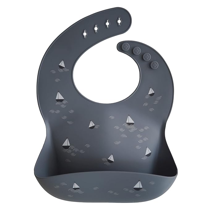 mushie Silicone Baby Bib | Adjustable Fit Waterproof Bibs (Boats)