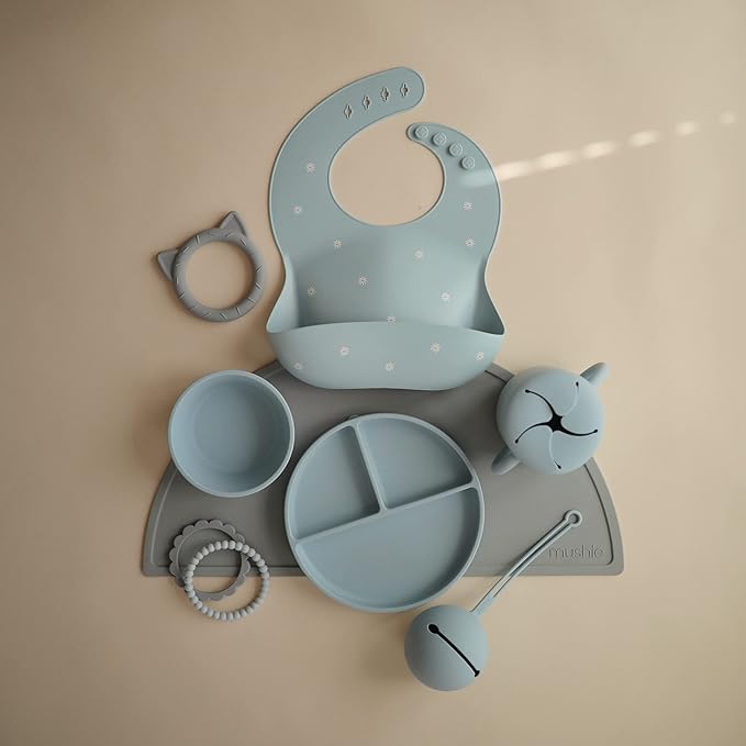 mushie Silicone Baby Bib | Adjustable Fit Waterproof Bibs (White Daisy)