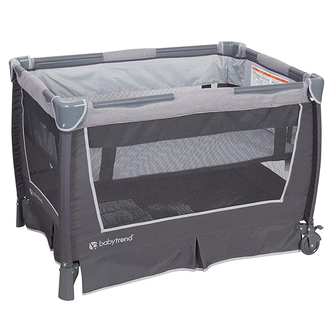 Baby Trend Nursery Center Travel Crib with Removable Rock-A-Bye Bassinet, Changing Table, Organizer, and Electronic Music Center and Nightlight, Robin