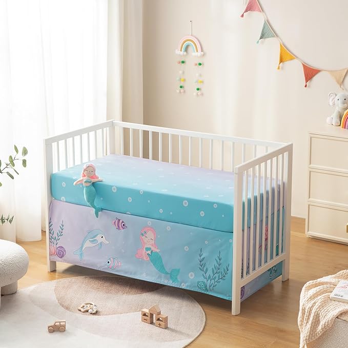 4 Piece Crib Bedding Set for Boys Girls, Infant Toddler Nursery Baby Bedding Sets Includes Cartoon Quilt, Fitted Crib Sheet, Crib Skirt and Plush Mermaid Toy