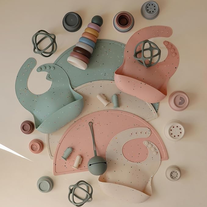 mushie Silicone Baby Bib | Adjustable Fit Waterproof Bibs (Powder Pink Confetti)