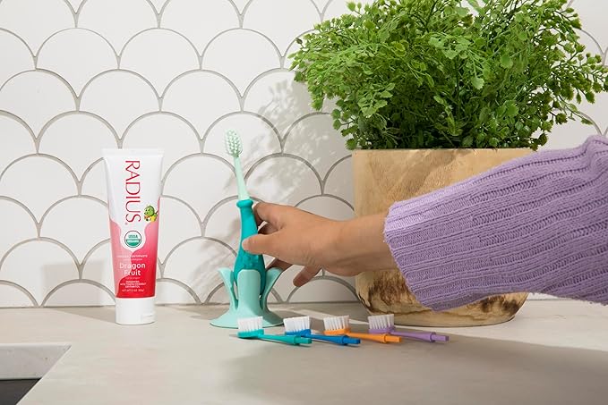 RADIUS Toddler Toothbrush and Toothpaste Bundle for Kids, 2 Pack Totz Extra Soft Brush in Blue and Green Sparkle and 1 Count Dragon Fruit Toothpaste, for Children 18 Months and Up